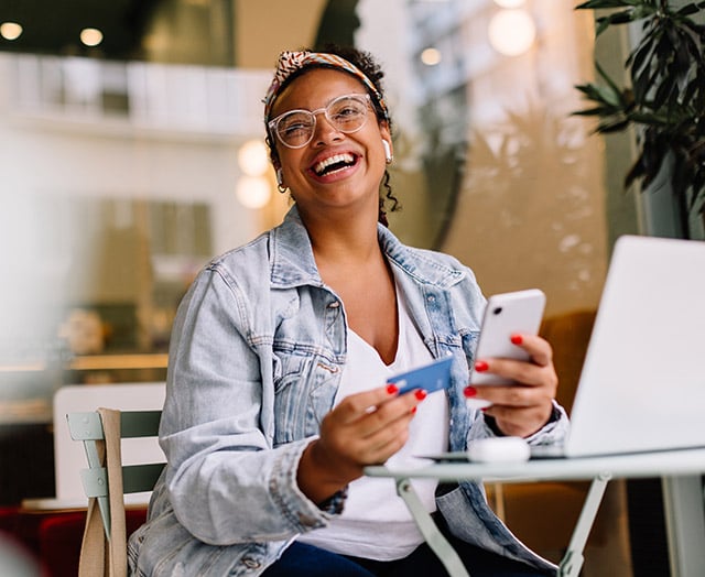 female controlling her cards with confidence at Leaders