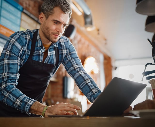 Leaders business member using SpendTrack