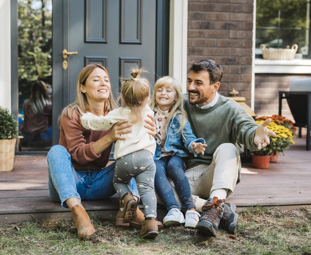 Happy Family who just refinanced their home