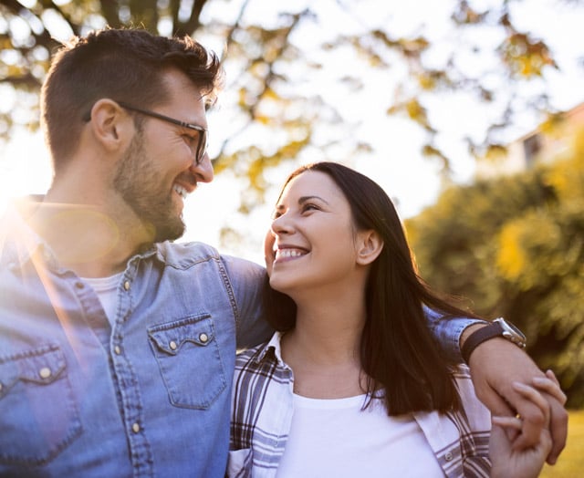Happy couple owning their dreams with Leaders